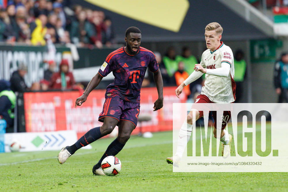 Dayot Upamecano 2, FC Bayern Munich, and Anton Kade 30, FC Augsburg, during the match between FC Augsburg and FC Bayern Munich, soccer, men s, Bundesliga, 2026–2027, Matchday 5 on October 10, 2026, in Augsburg, WWK ARENA. DFL and DFB regulations prohibit any use of photographs as image sequences and or quasi-video. Bayern, Germany