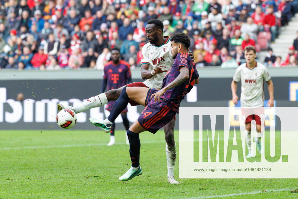 Chrislain Matsima 5, FC Augsburg, and Luis Diaz 14, FC Bayern Munich, during the match between FC Augsburg and FC Bayern Munich, soccer, men s, Bundesliga, 2026–2027, Matchday 5 on October 10, 2026, in Augsburg, WWK ARENA. DFL and DFB regulations prohibit any use of photographs as image sequences and or quasi-video. Bavaria, Germany