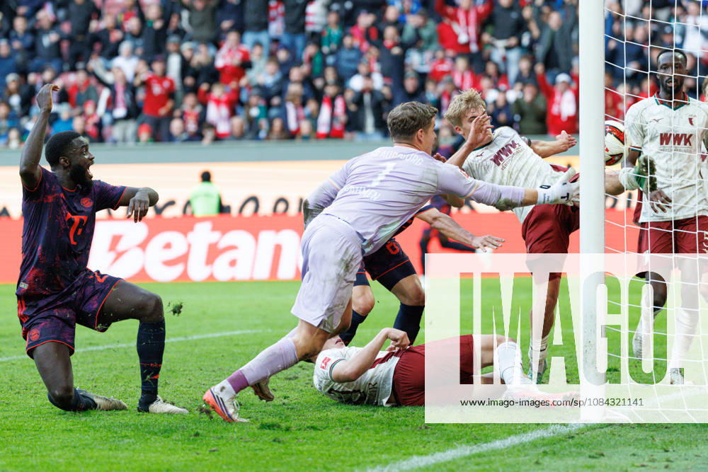 Hennes Behrens (16), FC Augsburg, and Finn Dahmen (1), FC Augsburg, make a save on the goal line during the match between FC Augsburg and FC Bayern Munich, soccer, men’s, Bundesliga, 2026–2027, Matchday 5 on October 10, 2026, in Augsburg, WWK ARENA. DFL and DFB regulations prohibit any use of photographs as image sequences and or quasi-video. Bavaria, Germany
