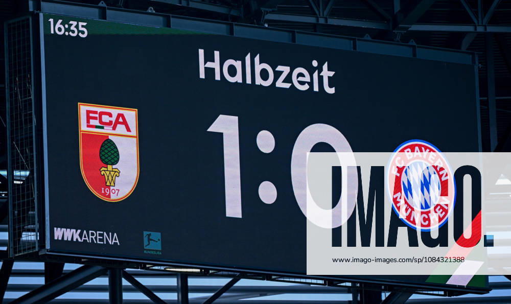 Soccer, Bundesliga 1, FC Augsburg vs. Bayern Munich – Scoreboard: Halftime score 1–0. DFL and DFB regulations prohibit any use of photographs as image sequences and or quasi-video. Augsburg