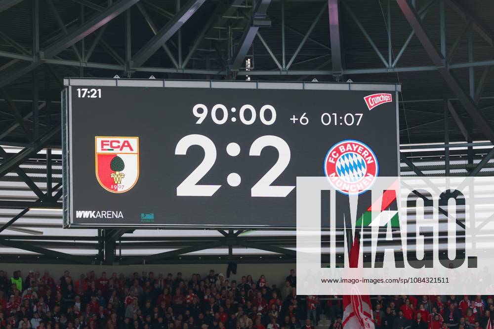 Final score on the scoreboard: 2–2, FC Augsburg vs. FC Bayern Munich, soccer, Bundesliga 1, Matchday 5, October 10, 2026. DFB and DFL regulations prohibit any use of photographs as image sequences and or quasi-video. Augsburg, Bayern, Germany
