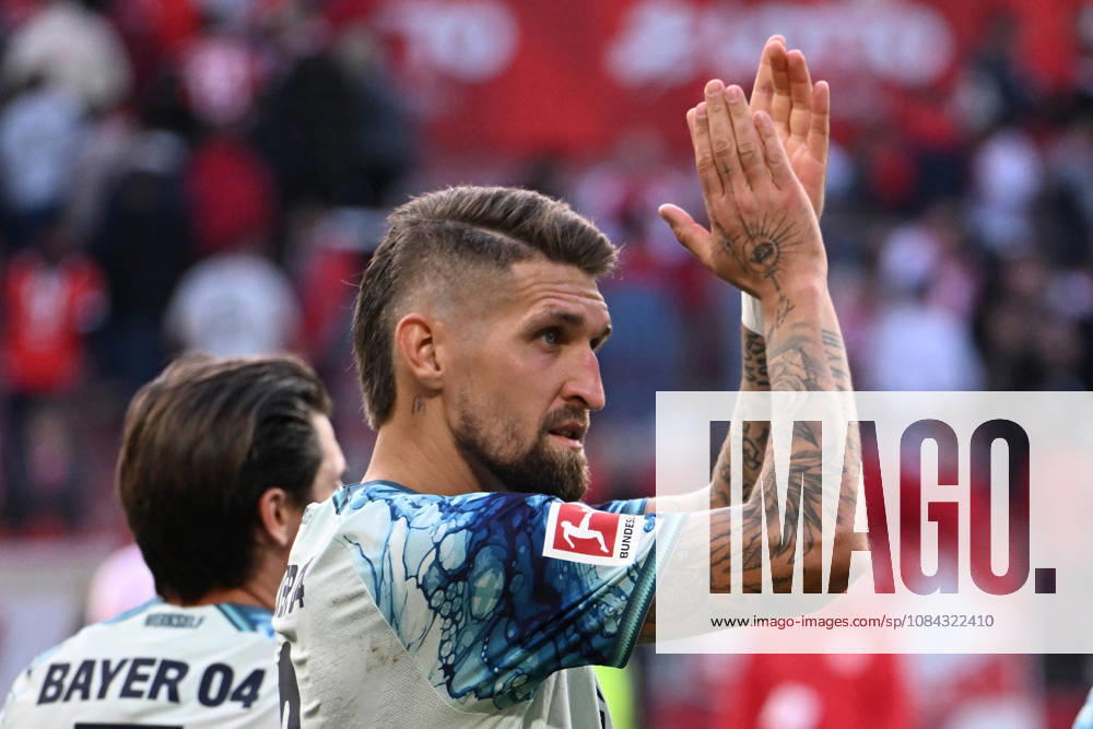 Soccer 1 Bundesliga, FSV Mainz 05 vs. Bayer 04 Leverkusen: Jubilation, joy over the victory—Robert Andrich, Bayer 04 Leverkusen. DFL and DFB regulations prohibit any use of photographs as image sequences and or quasi-video. Mainz