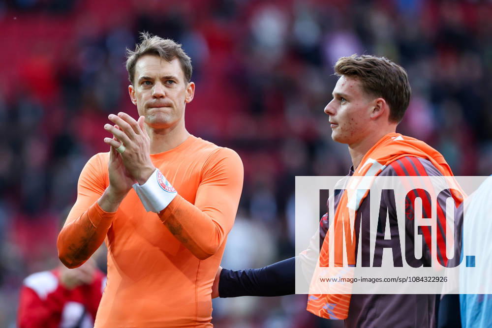 GER, Soccer, Men s, 1st Bundesliga, 2026–2027 season, Matchday 5, FC Augsburg vs. FC Bayern Munich: Manuel Neuer (FC Bayern Munich 1), left; Jonas Urbig (FC Bayern Munich 40), right. DFB and DFL regulations prohibit any use of photographs as image sequences and or quasi-video. Augsburg WWK Arena, Bayern, Germany