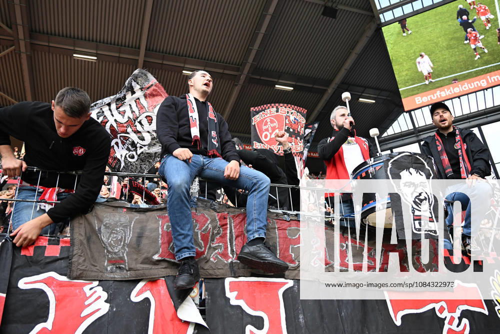 Soccer, Bundesliga 1, FSV Mainz 05 vs. Bayer 04 Leverkusen – fans, spectators, emotions, jerseys, flags, atmosphere, Bayer Leverkusen ultras. DFL and DFB regulations prohibit any use of photographs as image sequences and or quasi-video. Mainz