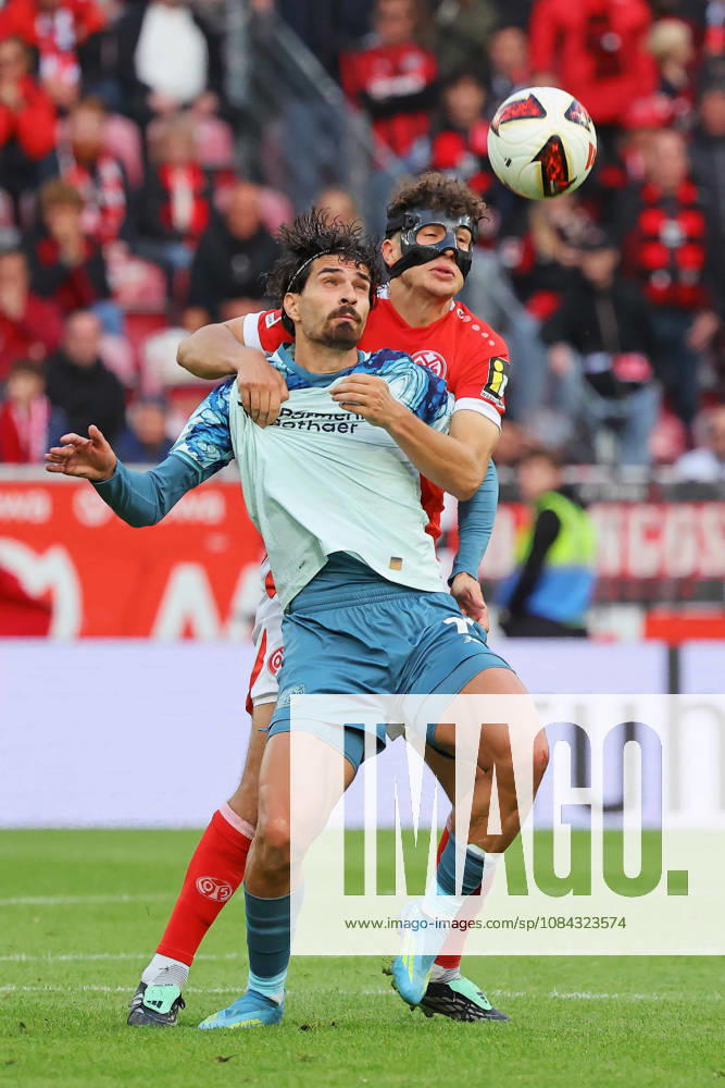 Mainz, Germany October 10, 2026 Bundesliga 2026–2027 Matchday 5: FSV Mainz 05 vs. Bayer 04 Leverkusen Pictured, from left, in a tackle: Martin Terrier (B04) against Fabio Gruber (M05). DFL regulations prohibit any use of photographs as image sequences and or quasi-video. Mewa Arena, Rhineland-Palatinate
