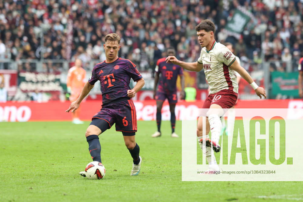 Joshua Kimmich, FC Bayern Munich, No. 06, with Mert Koemuer, FC Augsburg, No. 10, GER, FC Augsburg vs. FC Bayern Munich, Soccer, Bundesliga, Matchday 5, 2026–2027 Season, October 10, 2026, DFL and DFB regulations prohibit any use of photographs as image sequences and or quasi-video, GER, FC Augsburg vs. FC Bayern Munich, soccer, Bundesliga, Matchday 5, 2026–2027 season, October 10, 2026, Augsburg