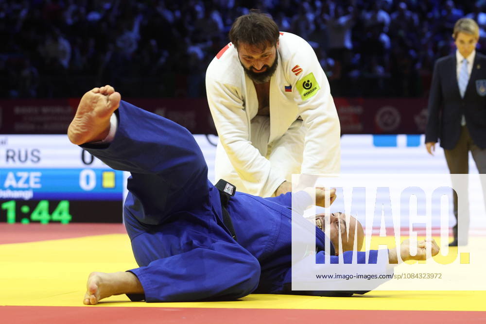 AZERBAIJAN, BAKU - OCTOBER 10, 2026: Russia s Inal Tasoev (standing) and Azerbaijan s Ushangi Kokauri fight in their heavyweight bout during the 2026 World Judo Championships at the National Gymnastics Arena 2026 World Judo Championships In Baku - ZUMAt113 20261010_zaa_t113_423