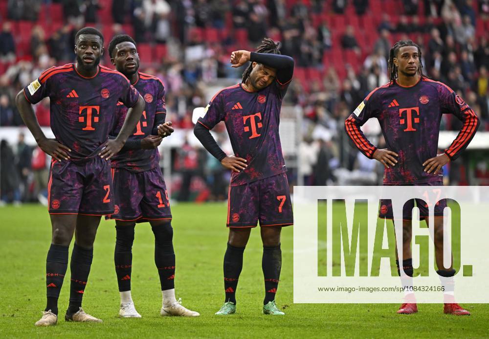 2026–2027 Bundesliga season, Matchday 5, FC Augsburg vs. FC Bayern Munich, at the WWK Arena in Augsburg; from left: Dayot Upamecano (FC Bayern Munich), Alphonso Davies (FC Bayern Munich), Serge Gnabry (FC Bayern Munich), and Michael Olise (FC Bayern Munich) look pensive and disappointed after the game.