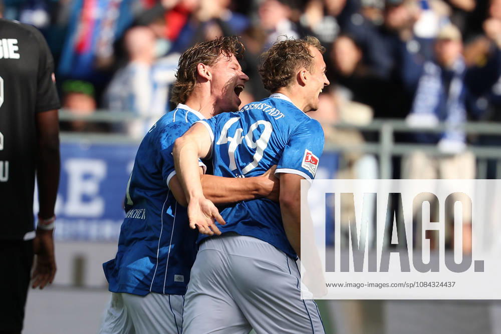 Soccer, 2. Bundesliga, SV Darmstadt 98 vs. Energie Cottbus: Fynn Luca Lakenmacher of SV Darmstadt 98 and Yannik Luehrs of SV Darmstadt 98 are seen celebrating after scoring a goal to make the score 3–1.