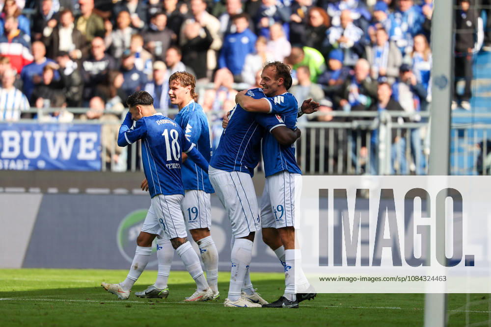 Soccer, 2. Bundesliga, SV Darmstadt 98 vs. Energie Cottbus; Patric Pfeiffer of SV Darmstadt 98 and Yannik Luehrs of SV Darmstadt 98 are seen celebrating after scoring a goal to make the score 3–1.