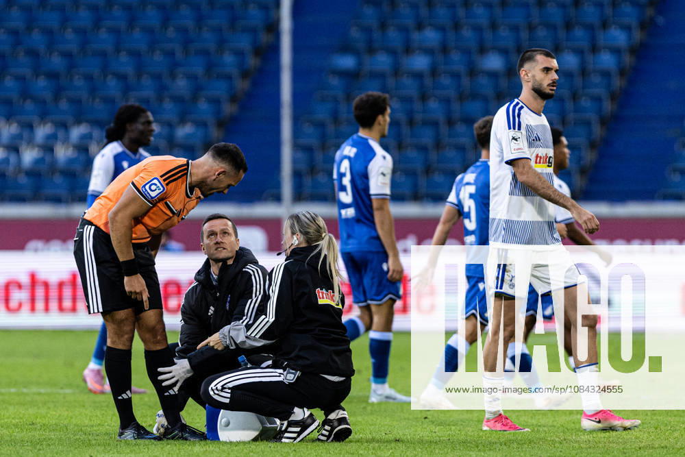3rd Division: MSV Duisburg vs. TSG Hoffenheim II, October 10, 2026. Referee Leonidas Exuzidis receives medical attention. 3rd Division, Matchday 8: MSV Duisburg vs. TSG Hoffenheim II at Schauinsland Reisen Arena, Duisburg, October 10, 2026 DFB regulations prohibit any use of photographs as image sequences and or quasi-video
