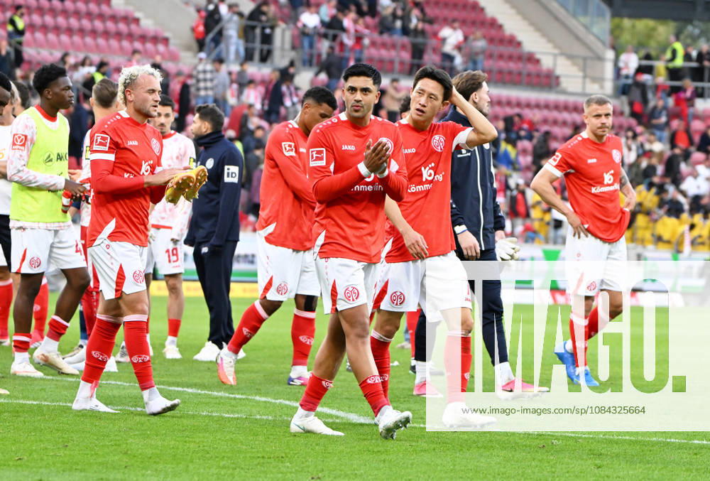 German Bundesliga 2026–2027 Season, Mewa Arena, Mainz, October 10, 2026: 1 FSV Mainz 05 (mz) vs. Bayer Leverkusen (lev) 3–4 (V li), Benedikt HOLLERBACH 1 FSV Mainz 05, Nadiem AMIRI 1 FSV Mainz 05 , Jae Sung LEE 1 FSV Mainz 05 DFL REGULATIONS PROHIBIT ANY USE OF PHOTOGRAPHS AS IMAGE SEQUENCES AND OR QUASI-VIDEO; FOR BY NATIONAL AND INTERNATIONAL NEWS AGENCIES. OUT: German Bundesliga 1 FSV Mainz 05