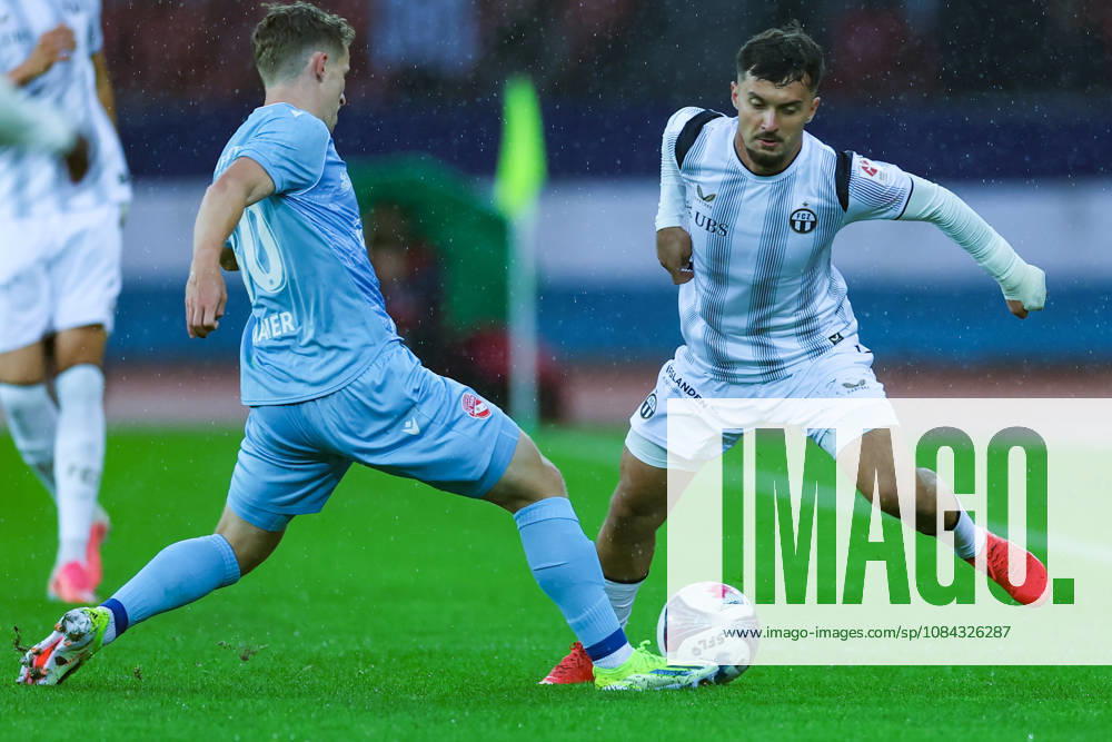 FC Zurich vs. FC Thun, Brack Super League, October 10, 2026. Nico Maier (30), FC Thun, left, in a tackle with Bledian Krasniqi (7), FC Zurich during the Brack Super League soccer match between FC Zurich and FC Thun on October 10, 2026, at Letzigrund Stadium, Zurich, Switzerland Zurich Letzigrund Stadium Zurich Switzerland