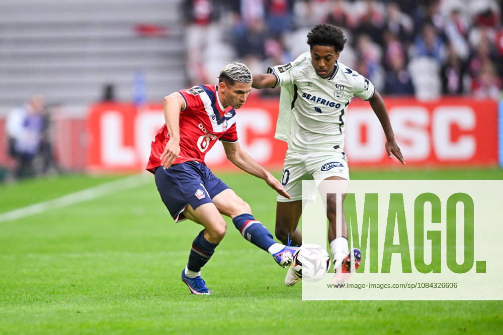 LOSC Lille v Le Havre Athletic Club - Ligue 1 McDonald s 2026 2027 Romain PERRAUD of Lille and Djibril OUZIAD of Le Havre during Ligue 1 McDonald s match between Lille and Le Havre at Stade Pierre-Mauroy on October 10, 2026 in Lille, France. Lille France