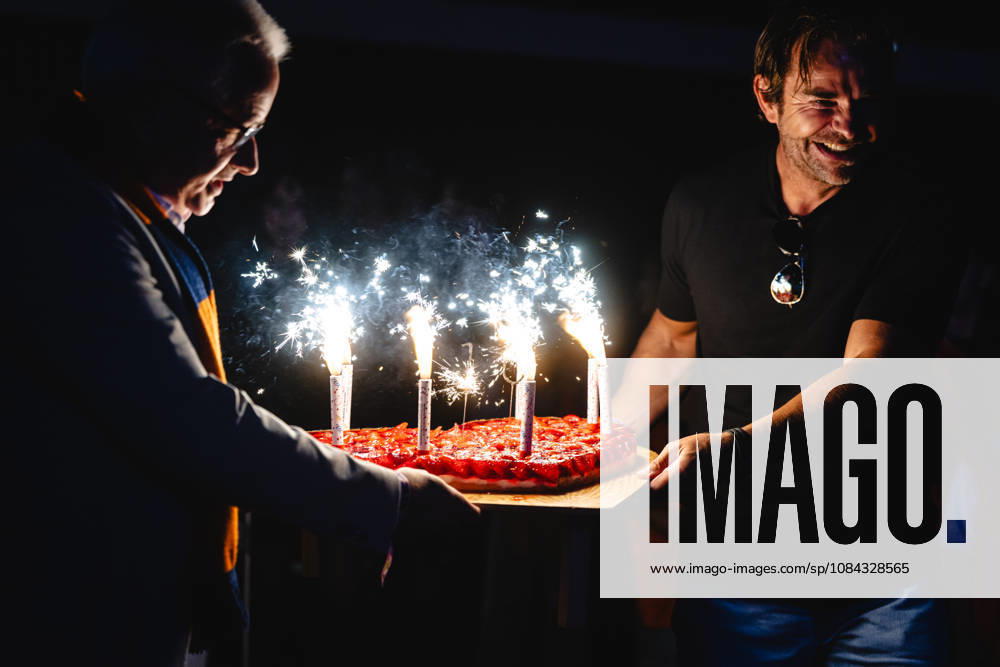 Rostock, Germany, October 10, 2026; easyCredit BBL 2026–2027, Matchday 5: Rostock Seawolves vs. Fitness First Würzburg Baskets. Pictured: Robert Dahl holding a cake with fireworks candles.