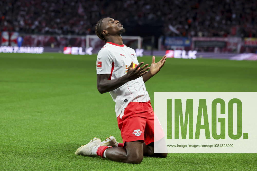 Ezechiel Banzuzi of RB Leipzig celebrates his goal to make it 1–0 during the Bundesliga match between RB Leipzig and Eintracht Frankfurt, Red Bull Arena on October 10, 2026, in Leipzig, Germany. Photo by Marco Steinbrenner, DeFodi Images. Ezechiel Banzuzi of RB Leipzig celebrates after scoring his team’s first goal during the Bundesliga match between RB Leipzig and Eintracht Frankfurt at Red Bull Arena on October 10, 2026 in Leipzig, Germany. Photo by Marco Steinbrenner, DeFodi Images. DFB and DFL regulations prohibit any use of photographs as image sequences and or quasi-video. Photo by Marco Steinbrenner, DeFodi Images.