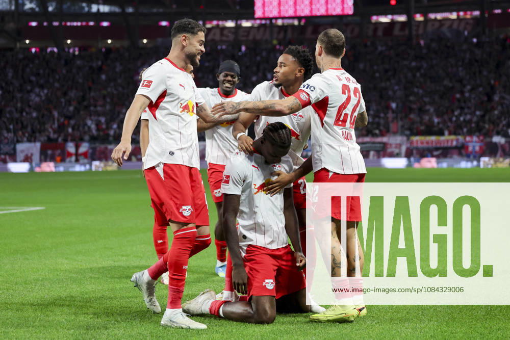 Ezechiel Banzuzi of RB Leipzig celebrates his goal with his teammates during the Bundesliga match between RB Leipzig and Eintracht Frankfurt, at Red Bull Arena on October 10, 2026, in Leipzig, Germany. Photo by Marco Steinbrenner, DeFodi Images. Ezechiel Banzuzi of RB Leipzig celebrates his goal with teammates during the Bundesliga match between RB Leipzig and Eintracht Frankfurt at Red Bull Arena on October 10, 2026 in Leipzig, Germany. Photo by Marco Steinbrenner, DeFodi Images. DFB and DFL regulations prohibit any use of photographs as image sequences and or quasi-video. Photo by Marco Steinbrenner, DeFodi Images.