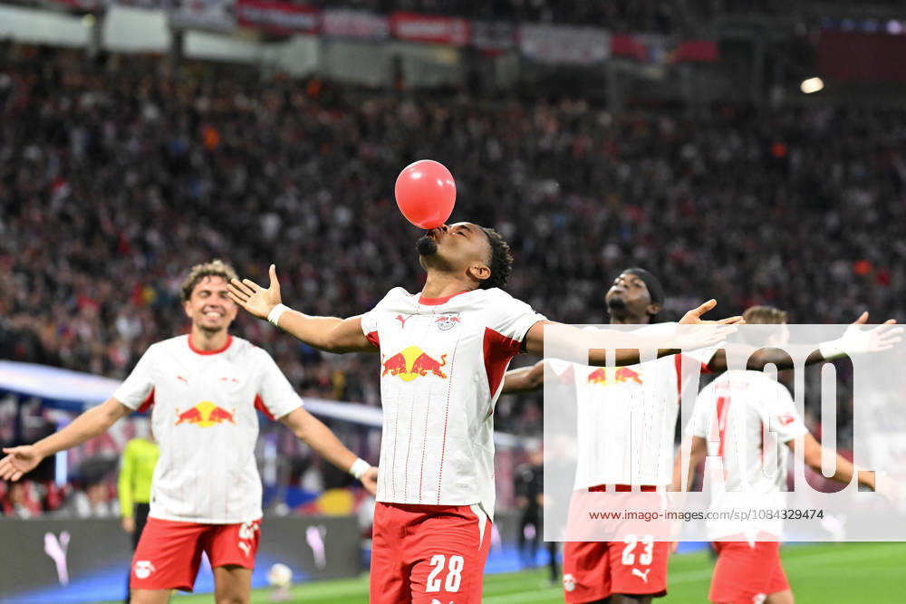 Soccer I Men s I 2026–2027 Season I Bundesliga I Matchday 5 I RB Leipzig vs. Eintracht Frankfurt I October 10, 2026: Christopher Nkunku celebrates a goal (28), RB Leipzig with a red balloon; cutout, close-up, portrait, single photo, single image, body; Leipzig, Red Bull Arena, Saxony, Germany