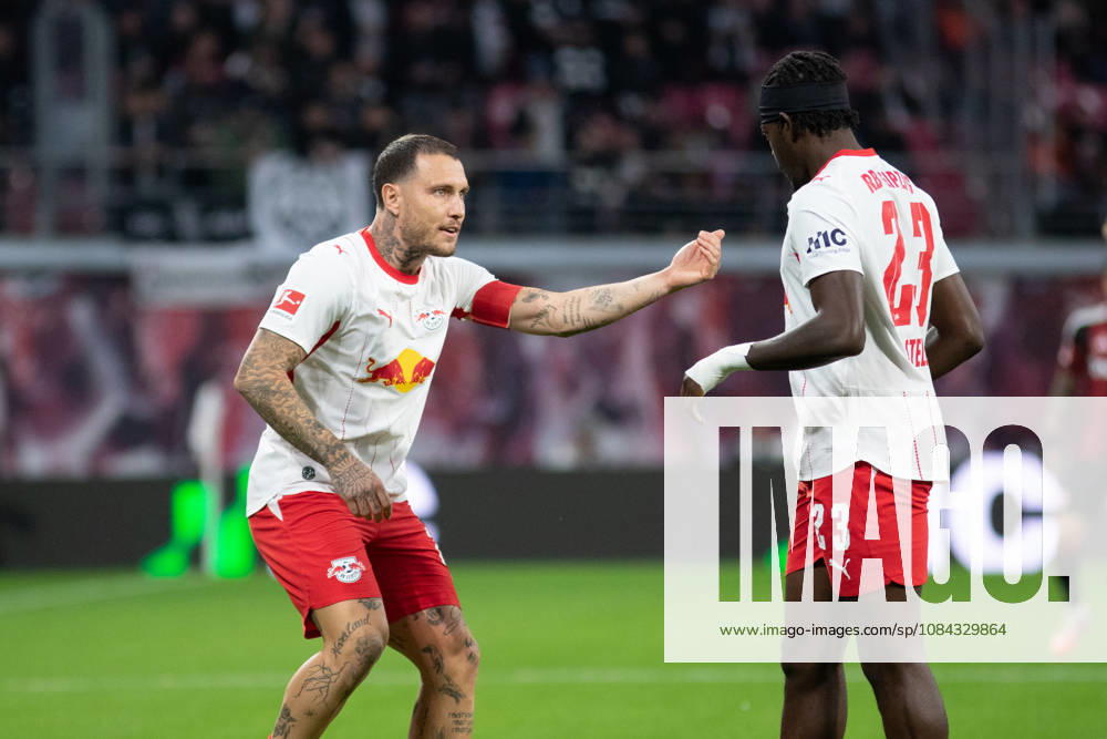 1 German Bundesliga: RB Leipzig vs. Eintracht Frankfurt, October 10, 2026; Captain David Raum (22), RB Leipzig, offers tips to Castello Lukeba (23), RB Leipzig; LEIPZIG, GERMANY OCTOBER 10 Bundesliga match between RB Leipzig and Eintracht Frankfurt at the Red Bull Arena on Matchday 5 of the 1. Bundesliga on October 10, 2026 in Leipzig, Germany. DFL regulations prohibit any use of photographs as image sequences and or quasi-video.