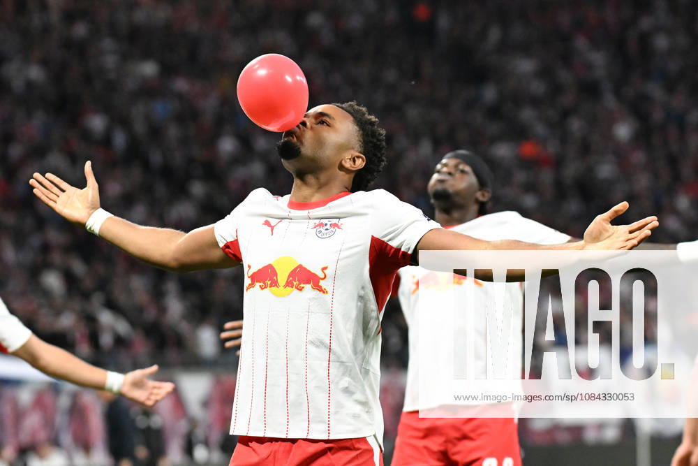 Soccer I Men I 2026–2027 Season I Bundesliga I Matchday 5 I RB Leipzig vs. Eintracht Frankfurt I October 10, 2026: Christopher Nkunku celebrates a goal (28), RB Leipzig with a red balloon; cutout, close-up, portrait, single photo, single image, body; Leipzig, Red Bull Arena, Saxony, Germany