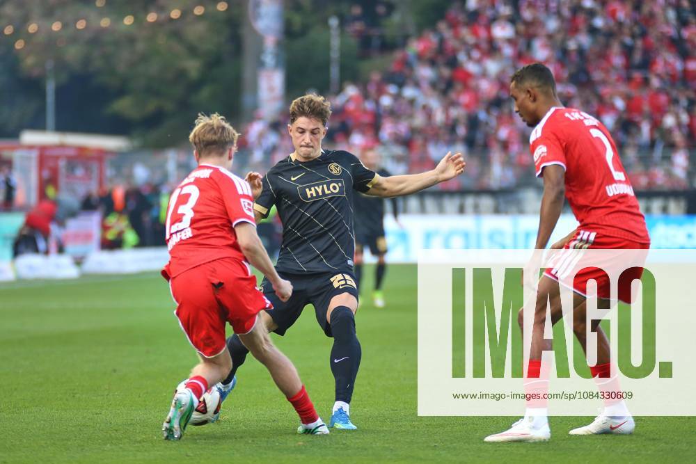 Berlin, Germany, October 10, 2026, Alte Försterei Stadium, Matchday 5, 2026–27 Season, 1 Bundesliga: Union Berlin vs. SV Elversberg; András Schäfer (13, Union Berlin), Lukas Petkov (25, SV Elversberg), and Felix Uduokhai (2, Union Berlin)
