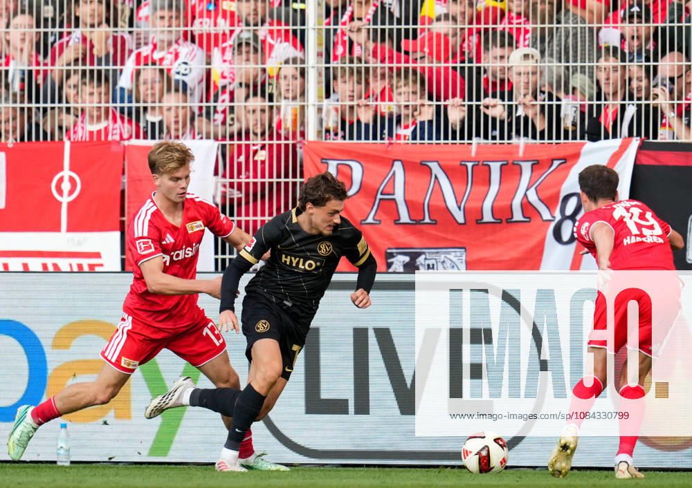 Andras Schaefer, 1 FC Union Berlin, 13, in a tackle with Maurice Krattenmacher, SV Elversberg, 7 GER, 1 FC Union Berlin vs. SV Elversberg, 1 Bundesliga, Matchday 5, 2026–27 season, Stadion An der Alten Foersterei, Berlin, October 10, 2026 DFL regulations prohibit any use of photographs as image sequences and or quasi-video 1 FC Union Berlin vs. SV Elversberg, 1 Bundesliga, Matchday 5, 2026–27 season, October 10, 2026, Berlin