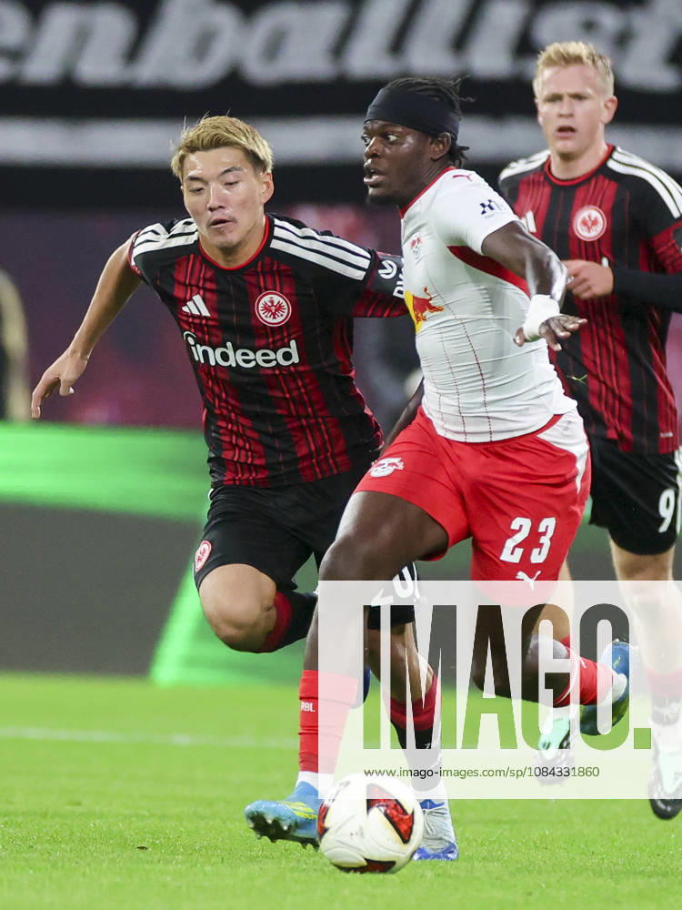 Ritsu Doan of Eintracht Frankfurt and Castello Lukeba of RB Leipzig battle for the ball during the Bundesliga match between RB Leipzig and Eintracht Frankfurt, Red Bull Arena on October 10, 2026, in Leipzig, Germany. Photo by Marco Steinbrenner, DeFodi Images. Ritsu Doan of Eintracht Frankfurt and Castello Lukeba of RB Leipzig battle for the ball during the Bundesliga match between RB Leipzig and Eintracht Frankfurt at Red Bull Arena on October 10, 2026 in Leipzig, Germany. Photo by Marco Steinbrenner, DeFodi Images. DFB and DFL regulations prohibit any use of photographs as image sequences and or quasi-video. Photo by Marco Steinbrenner, DeFodi Images