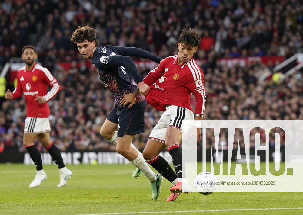 Manchester, England, 10th October 2026. Archie Gray of Tottenham tussles with Lisandro Martinez of Manchester United, ManU during the Manchester United vs Tottenham Hotspur Premier League match at Old Trafford, Manchester. Picture credit should read: Andrew Yates Sportimage . SPI_032_AY_MANUTD_SPURS SPI-5058-0032