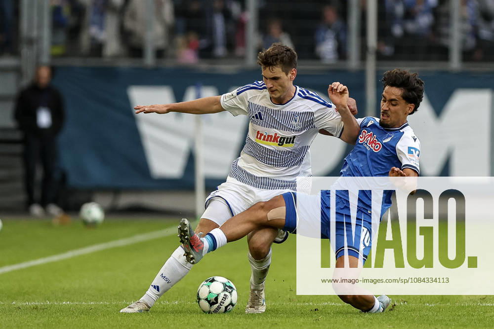 GER, Soccer, Men s, 3rd Division, 2026–2027 Season, MSV Duisburg vs. TSG Hoffenheim II: Martin Ens (Duisburg) and Muhammed Yasin Batuhan Zor (TSG II) battle for the ball; Duisburg, Schauinsland, Arena, North Rhine-Westphalia, Germany