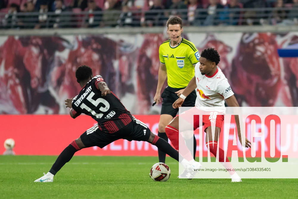 1 German Bundesliga: RB Leipzig vs. Eintracht Frankfurt, October 10, 2026. From left: Noel Aseko (15), Eintracht Frankfurt; referee Daniel Siebert; Christopher Nkunku (28), RB Leipzig. LEIPZIG, GERMANY OCTOBER 10 Bundesliga match between RB Leipzig and Eintracht Frankfurt at the Red Bull Arena on Matchday 5 of the 1. Bundesliga on October 10, 2026 in Leipzig, Germany. DFL regulations prohibit any use of photographs as image sequences and or quasi-video.