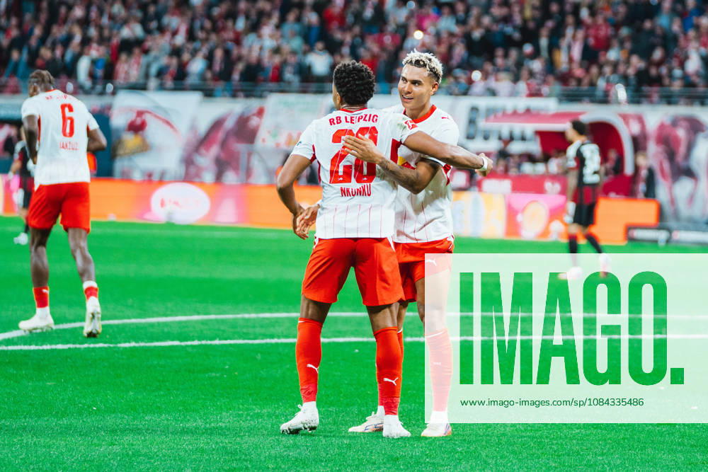 Christopher Nkunku (RB Leipzig, 28) celebrates with Antonio Nusa (RB Leipzig, 7) RB Leipzig vs Eintracht Frankfurt, Bundesliga, Germany, Football, 26 27, GER, Leipzig, Red Bull Arena Stadium DFL regulations prohibit any use of photographs as image sequences and or quasi-video.DFL regulations prohibit any use of photographs as image sequences and or quasi-video. Leipzig Red Bull Arena, Leipzig Sachsen GER