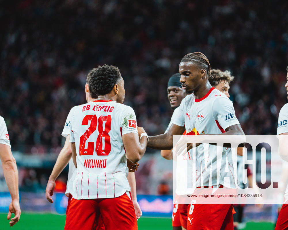 Christopher Nkunku (RB Leipzig, 28) celebrates with Ezechiel Banzuzi (RB Leipzig, 6) RB Leipzig vs Eintracht Frankfurt, Bundesliga, Germany, Football, 26 27, GER, Leipzig, Red Bull Arena Stadium DFL regulations prohibit any use of photographs as image sequences and or quasi-video.DFL regulations prohibit any use of photographs as image sequences and or quasi-video. Leipzig Red Bull Arena, Leipzig Sachsen GER