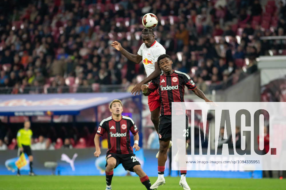 1 German Bundesliga RB Leipzig vs. Eintracht Frankfurt October 10, 2026 Ezechiel Banzuzi 6, RB Leipzig in the air against Raphael Onyedika 25, Eintracht Frankfurt LEIPZIG, GERMANY OCTOBER 10 Bundesliga match between RB Leipzig and Eintracht Frankfurt at the Red Bull Arena on Matchday 5 of the 1. Bundesliga on October 10, 2026 in Leipzig, Germany. DFL regulations prohibit any use of photographs as image sequences and or quasi-video.