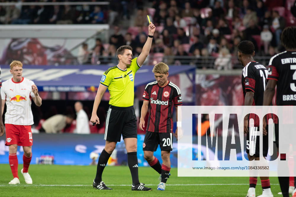 1 German Bundesliga RB Leipzig vs. Eintracht Frankfurt October 10, 2026 Referee Daniel Siebert shows a yellow card, caution LEIPZIG, GERMANY OCTOBER 10 Bundesliga match between RB Leipzig and Eintracht Frankfurt at the Red Bull Arena on Matchday 5 of the Bundesliga on October 10, 2026 in Leipzig, Germany. DFL regulations prohibit any use of photographs as image sequences and or quasi-video.