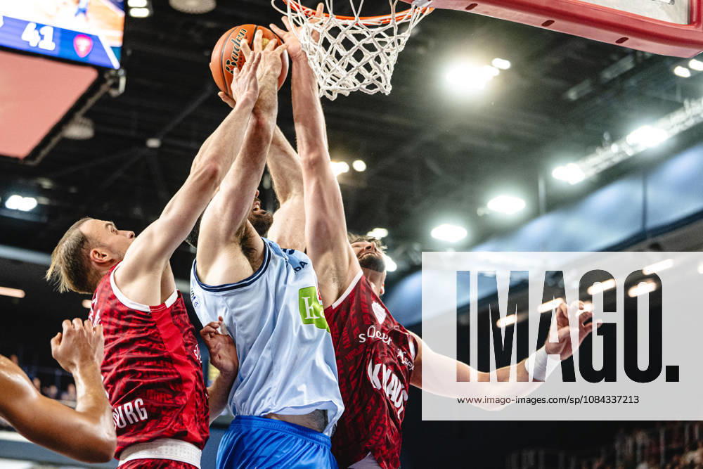 Rostock, Germany, October 10, 2026, easyCredit BBL 2026–2027, Matchday 5: Rostock Seawolves vs. Fitness First Würzburg Baskets. Pictured from left to right in a one-on-one battle: Lukas Herzog (Fitness First Würzburg Baskets), Owen Klassen (Rostock Seawolves), and Leo Saffer Fitness First Würzburg Baskets