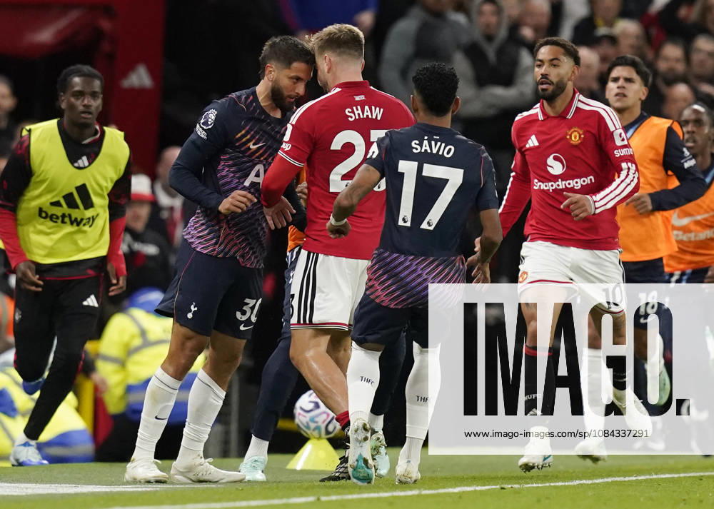 Manchester, England, 10th October 2026. Rodrigo Bentancur of Tottenham Hotspur (L) headsets Luke Shaw of Manchester United, ManU resulting in a red card during the Manchester United vs Tottenham Hotspur Premier League match at Old Trafford, Manchester. Picture credit should read: Andrew Yates Sportimage . SPI_044_AY_MANUTD_SPURS SPI-5058-0044