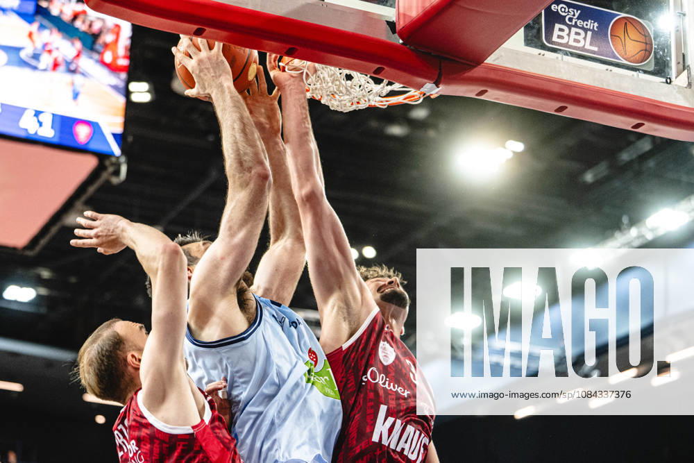 Rostock, Germany, October 10, 2026, easyCredit BBL 2026–2027, Matchday 5: Rostock Seawolves vs. Fitness First Würzburg Baskets. Pictured from left to right in a one-on-one battle: Lukas Herzog (Fitness First Würzburg Baskets), Owen Klassen (Rostock Seawolves), and Leo Saffer Fitness First Würzburg Baskets