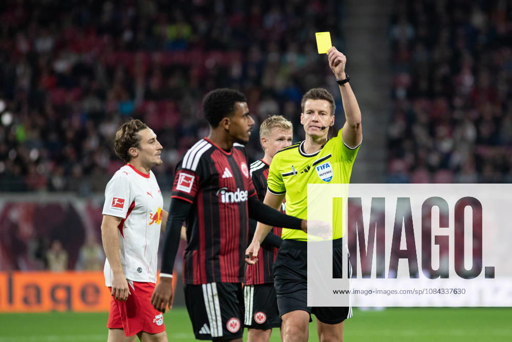 1 German Bundesliga RB Leipzig vs. Eintracht Frankfurt October 10, 2026 Referee Daniel Siebert shows a yellow card, caution LEIPZIG, GERMANY OCTOBER 10 Bundesliga match between RB Leipzig and Eintracht Frankfurt at the Red Bull Arena on Matchday 5 of the Bundesliga on October 10, 2026 in Leipzig, Germany. DFL regulations prohibit any use of photographs as image sequences and or quasi-video.