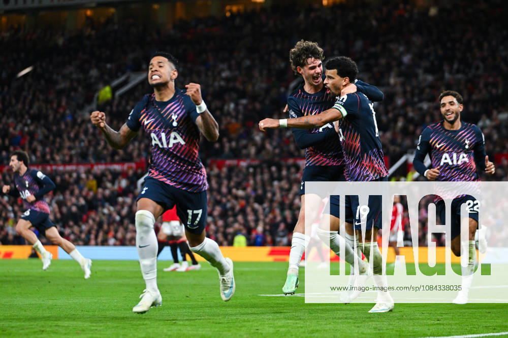 MANCHESTER, ENGLAND, OCT 10: Dominic Solanke of Tottenham Hotspur celebrates with teammate Archie Gray after scoring his sides first goal during the Premier League match between Manchester United, ManU and Tottenham Hotspur at Old Trafford in Manchester, England (Will Palmer Sports Press Photo)