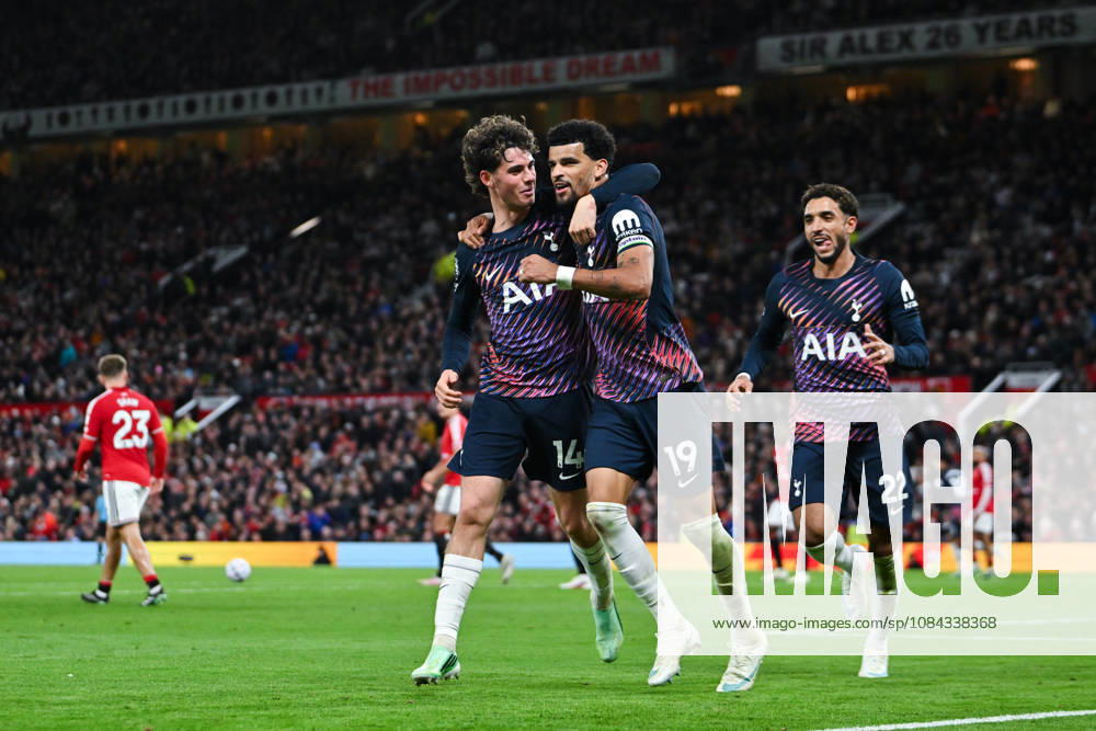 MANCHESTER, ENGLAND, OCT 10: Dominic Solanke (R) of Tottenham Hotspur celebrates with teammate Archie Gray after scoring his sides first goal during the Premier League match between Manchester United, ManU and Tottenham Hotspur at Old Trafford in Manchester, England (Will Palmer Sports Press Photo)