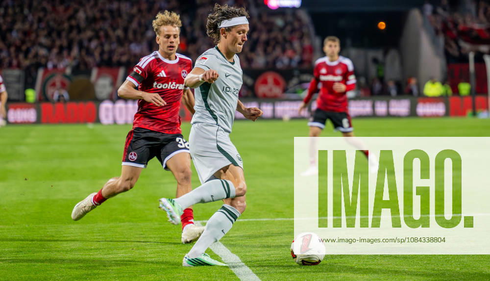 Soccer Season 2026–2027, Bundesliga 2, Matchday 7: 1. FC Nürnberg (FCN) vs. VfL Wolfsburg (WOB) Wolves Sports Photo by Zink . DFL regulations prohibit any use of photographs as image sequences and or quasi-video; for editorial use only. Fabian Reese 11, VfL Wolfsburg in front of Tim Janisch 32, 1 FC Nuremberg (FCN)