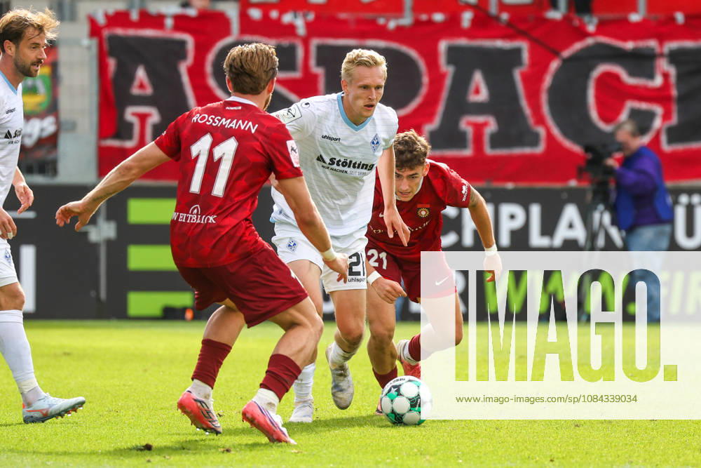 Tim Rossmann (SG Sonnenhof Großaspach), 11, Julian Rieckmann (SV Waldhof Mannheim), 21, Luca Molinari (SG Sonnenhof Großaspach), 21, from left to right, battling for the ball in a 3. Liga match, Matchday 8, SG Sonnenhof Großaspach vs. SV Waldhof Mannheim on October 10, 2026, at the WIRmachenDRUCK Arena in Aspach Großaspach, Germany; Aspach Großaspach, WIRmachenDRUCK Arena, Germany