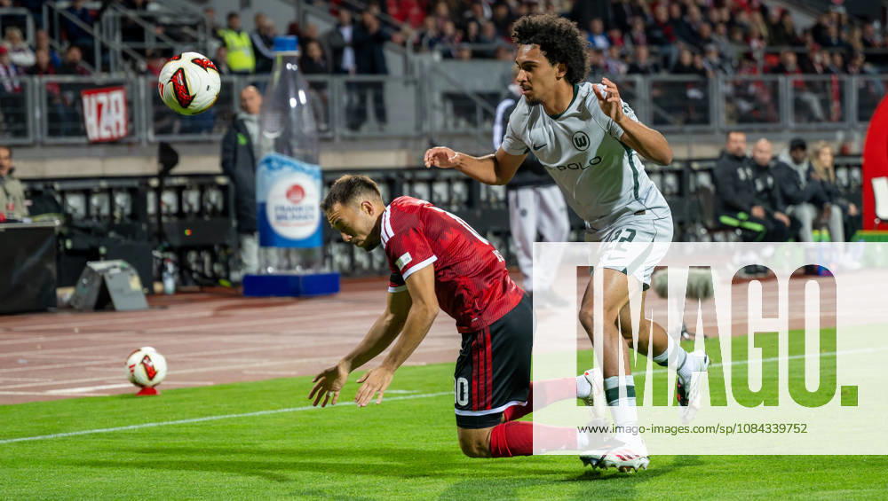 Soccer Season 2026–2027, Matchday 2, Bundesliga, Matchday 7: 1. FC Nürnberg (FCN) vs. VfL Wolfsburg (WOB), Wolves. Sports photo by Zink . DFL regulations prohibit any use of photographs as image sequences and or quasi-video; for editorial use only. Julian Justvan 10, 1 FC Nuremberg (FCN) Mathys Angely 22, VfL Wolfsburg