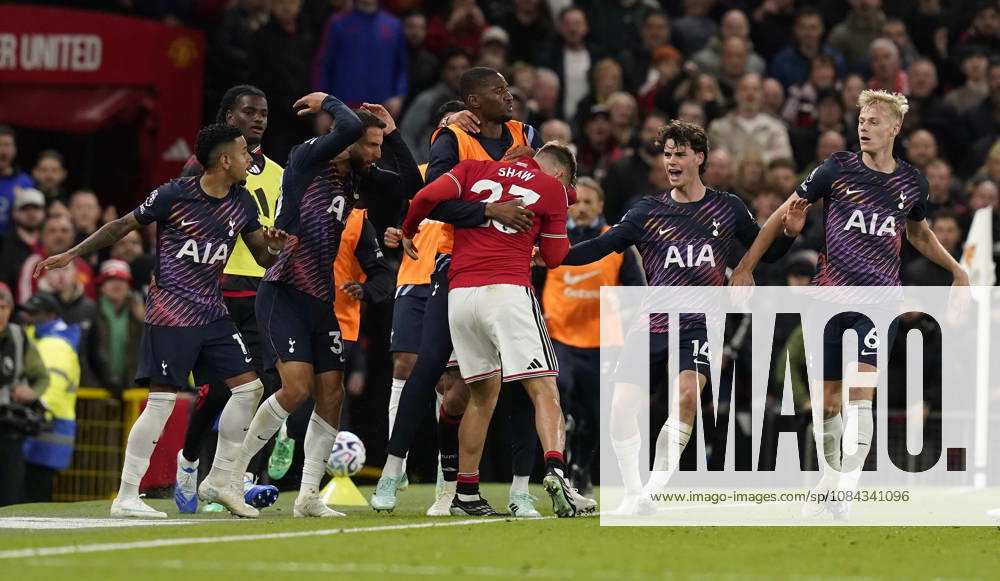 Manchester, England, 10th October 2026. Rodrigo Bentancur of Tottenham Hotspur (2L) confronts Luke Shaw of Manchester United, ManU after head butting him during the Manchester United vs Tottenham Hotspur Premier League match at Old Trafford, Manchester. Picture credit should read: Andrew Yates Sportimage . SPI_061_AY_MANUTD_SPURS SPI-5058-0061