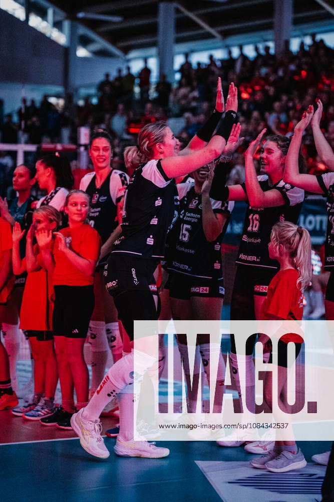 Pictured: Patricia Nestler 1, Dresdner SC, high-fives Morgan Geddes 16, Dresdner SC, on October 10, 2026, Dresdner SC vs. Allianz MTV Stuttgart, DEKRA 1 Bundesliga Women, Volleyball, Germany, Dresden, Cyberport Arena