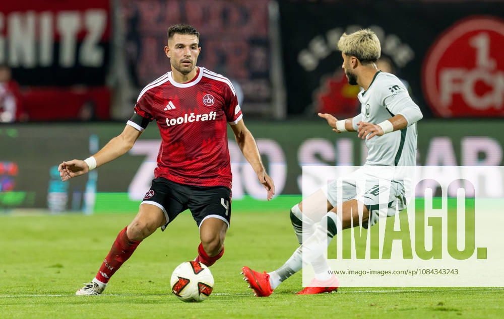 Soccer Season 2026–2027, Matchday 2, Bundesliga, Matchday 7: 1. FC Nürnberg (FCN) vs. VfL Wolfsburg (WOB) – Wolves. Sports photo by Zink . DFL regulations prohibit any use of photographs as image sequences and or quasi-video; for editorial use only. Alexios Kalogeropoulos 4, 1 FC Nuremberg (FCN), Muhammed Damar 20, VfL Wolfsburg