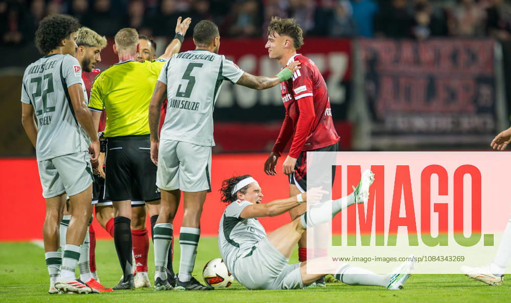 Soccer Season 2026–2027, Matchday 2, Bundesliga, Matchday 7: 1. FC Nürnberg (FCN) vs. VfL Wolfsburg (WOB), Wolves Sports Photo by Zink . DFL regulations prohibit any use of photographs as image sequences and or quasi-video; for editorial use only. Fabian Reese 11, VfL Wolfsburg, injured on the ground