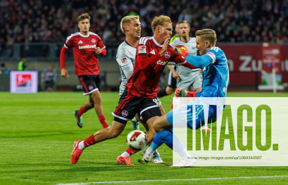 Soccer Season 2026–2027, Matchday 2, Bundesliga, Matchday 7: 1. FC Nürnberg (FCN) vs. VfL Wolfsburg (Wob, Wolves) Sports photo by Zink DaMa . DFL regulations prohibit any use of photographs as image sequences and or quasi-video; for editorial use only. Jan Reichert 1, 1 FC Nuremberg (FCN) clears the ball in front of the penalty area