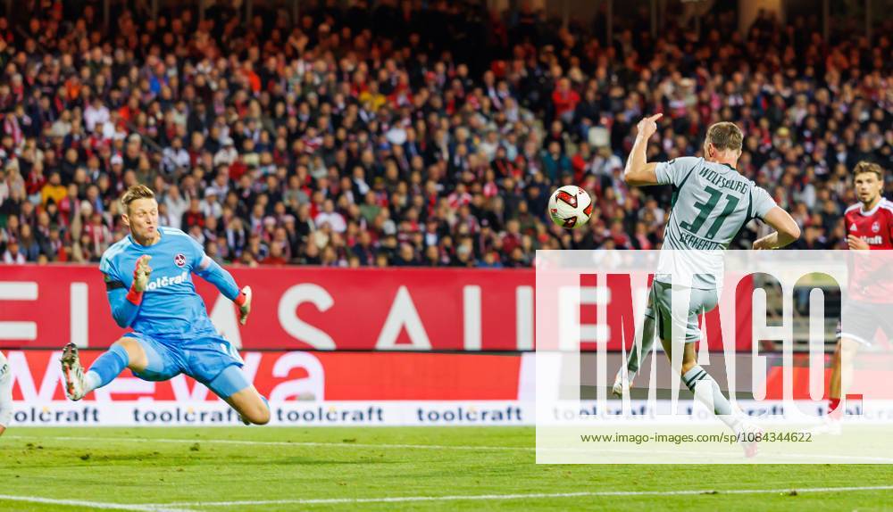 Soccer Season 2026–2027, Bundesliga, Matchday 7: 1. FC Nürnberg (FCN) vs. VfL Wolfsburg (Wob, Wolves) Sports photo by Zink DaMa . DFL regulations prohibit any use of photographs as image sequences and or quasi-video; for editorial use only. Yannick Gerhardt 31, VfL Wolfsburg, takes a shot on goal against Jan Reichert 1, 1 FC Nuremberg (FCN)