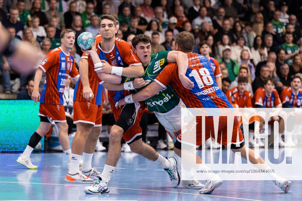 Elias NEWEL (FRISCH AUF Goeppingen), 40, in a one-on-one battle against Nikola VLAHOVIC (SG BBM Bietigheim), 03, and Fabian WIEDERSTEIN (SG BBM Bietigheim), 18, GER, FRISCH AUF Goeppingen vs. SG BBM Bietigheim, Handball, Bundesliga, OPEL HBL, Matchday 8, 2026–2027 Season, October 10, 2026, GER, FRISCH AUF Goeppingen vs. SG BBM Bietigheim, Handball, Bundesliga, OPEL HBL, Matchday 8, 2026–2027 Season, October 10, 2026, Goeppingen